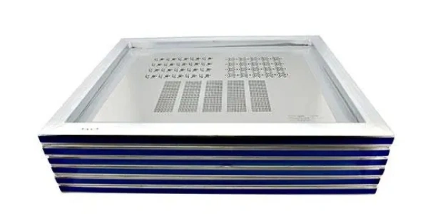 Tensioned framed SMT stencil with laser-cut apertures for QFP/BGA and fine-pitch pads used in high-volume paste printing.